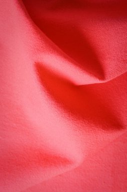 Kumaş kumaşın kırmızı dokusu, moda bezi tasarımı için soyut görüntü