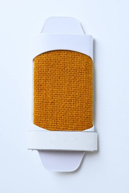 Giyim endüstrisinin renkli kumaş tekstilinin turuncu kahverengi tonu