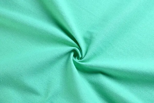 light green mint color texture of fabric textile, abstract image for fashion cloth design background