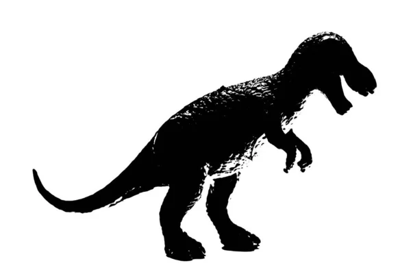 stock image black dinosaur silhouette isolated on white background, model of T-rex toys