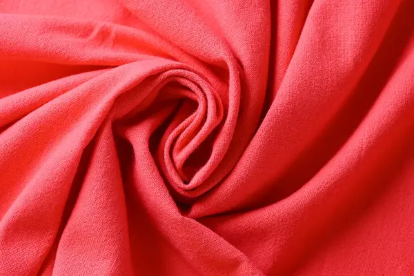 red texture of roll fabric textile, abstract image for fashion cloth design background