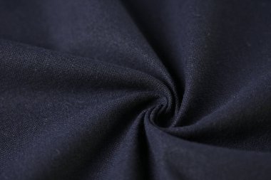 Kumaş tekstil endüstrisinin siyah pamuk dokusu, moda bezi tasarımı için soyut koyu görüntü