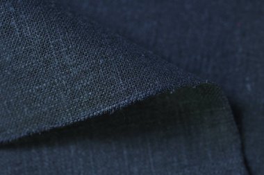 Siyah kenevir doğal kumaş kumaş rengi, tekstil modasının kaba dokusu soyut arkaplan