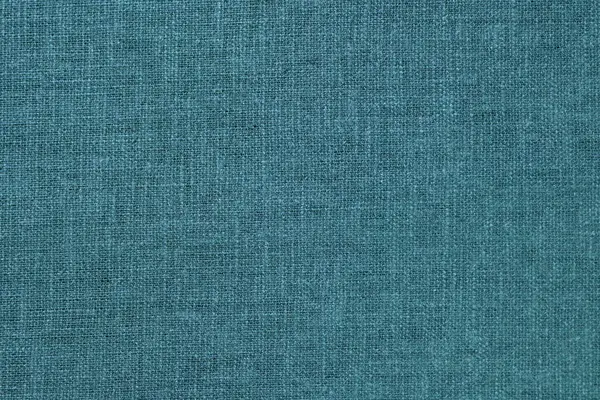 Yeşil kenevir doğal kumaş kumaş rengi, tekstil modasının kaba dokusu soyut arkaplan
