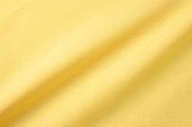 Kumaş tekstil endüstrisinin sarı pamuk dokusu rengi, moda bezi tasarımı için soyut görüntü