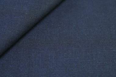 Siyah kenevir doğal kumaş kumaş rengi, tekstil modasının kaba dokusu soyut arkaplan