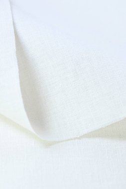 Beyaz krem kenevir doğal kumaş kumaş rengi, tekstil modasının kaba dokusu soyut arka plan