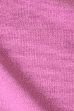 Kumaş tekstil endüstrisinin pembe pamuk dokusu rengi, moda bezi tasarımı için soyut görüntü
