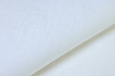 Beyaz krem kenevir doğal kumaş kumaş rengi, tekstil modasının kaba dokusu soyut arka plan