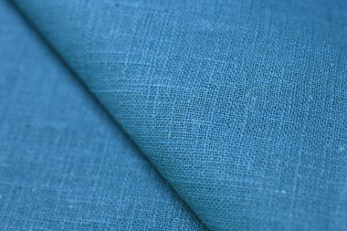 Mavi yeşil kenevir doğal kumaş kumaş rengi, tekstil moda soyut arka planının kabataslak kumaşı