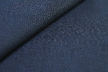 Siyah kenevir doğal kumaş kumaş rengi, tekstil modasının kaba dokusu soyut arkaplan