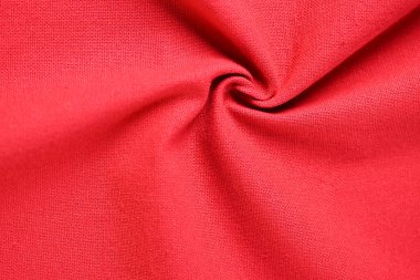 Kumaş tekstil endüstrisinin kırmızı pamuk dokusu rengi, moda bezi tasarımı için soyut görüntü