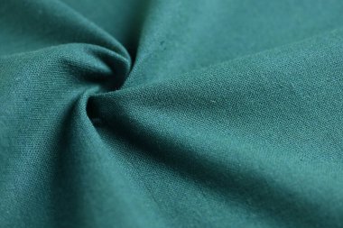Kumaş dokusunun koyu yeşil dokusu, moda bezi tasarımı için soyut resim