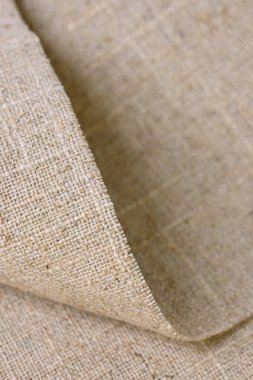 kahverengi kenevir doğal kumaş kumaş kumaş, tekstil modasının kaba dokusu soyut arkaplan