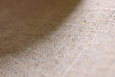 kahverengi kenevir doğal kumaş kumaş kumaş, tekstil modasının kaba dokusu soyut arkaplan