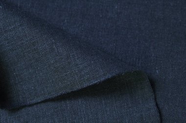 Siyah kenevir doğal kumaş kumaş rengi, tekstil modasının kaba dokusu soyut arkaplan