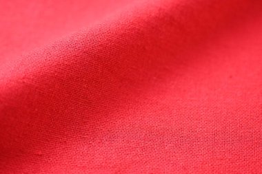 Kumaş tekstil endüstrisinin kırmızı pamuk dokusu rengi, moda bezi tasarımı için soyut görüntü
