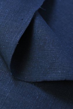 Mavi kenevir doğal kumaş kumaş rengi, tekstil moda soyut arka planının kabataslak kumaşı.