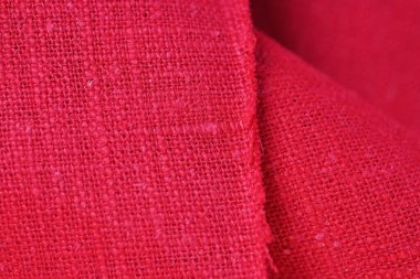 Kırmızı kenevir doğal kumaş kumaş rengi, tekstil modasının kaba dokusu soyut arkaplan