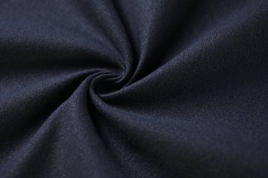 Kumaş tekstil endüstrisinin siyah pamuk dokusu, moda bezi tasarımı için soyut koyu görüntü