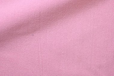 Kumaş tekstil endüstrisinin pembe gül pamuk dokusu rengi, moda bezi tasarımı için soyut görüntü