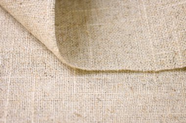 kahverengi kenevir doğal kumaş kumaş kumaş, tekstil modasının kaba dokusu soyut arkaplan