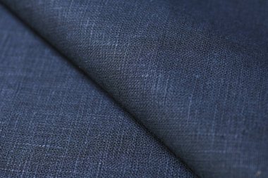 Siyah kenevir doğal kumaş kumaş rengi, tekstil modasının kaba dokusu soyut arkaplan
