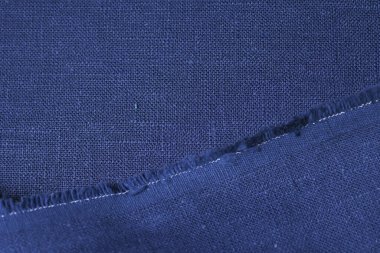Mavi kenevir doğal kumaş kumaş rengi, tekstil moda soyut arka planının kabataslak kumaşı.