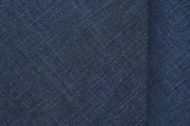 Siyah kenevir doğal kumaş kumaş rengi, tekstil modasının kaba dokusu soyut arkaplan