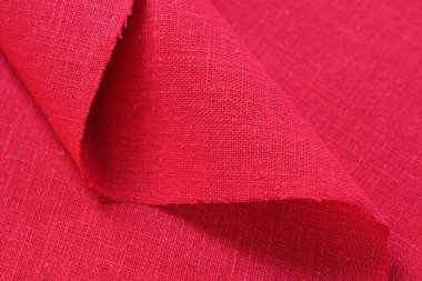 Kırmızı kenevir doğal kumaş kumaş rengi, tekstil modasının kaba dokusu soyut arkaplan