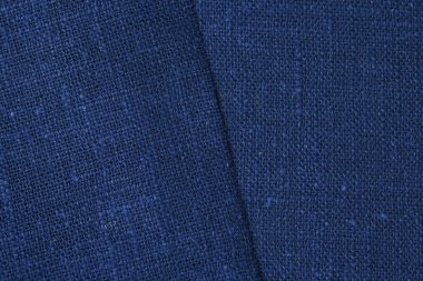 Mavi kenevir doğal kumaş kumaş rengi, tekstil moda soyut arka planının kabataslak kumaşı.