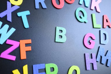 colorful letter alphabet on black background, object for education
