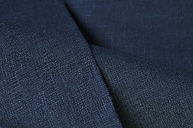 Siyah kenevir doğal kumaş kumaş rengi, tekstil modasının kaba dokusu soyut arkaplan