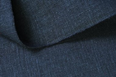 Siyah kenevir doğal kumaş kumaş rengi, tekstil modasının kaba dokusu soyut arkaplan