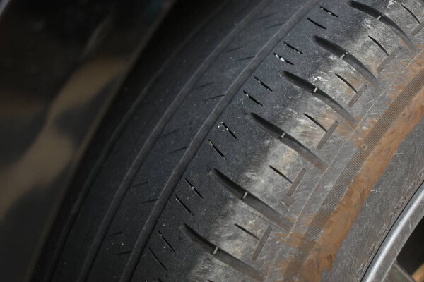 Dirty black tire car texture, transportation industry