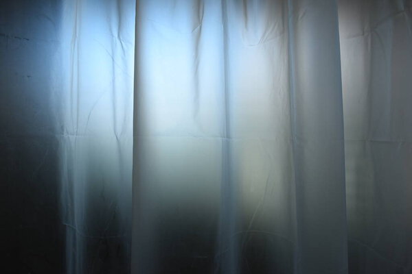 white plastic curtain texture in bathroom, scary scene