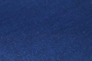 Mavi kenevir doğal kumaş kumaş rengi, tekstil moda soyut arka planının kabataslak kumaşı.