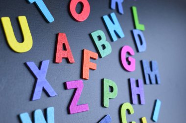 colorful letter alphabet on black background, object for education