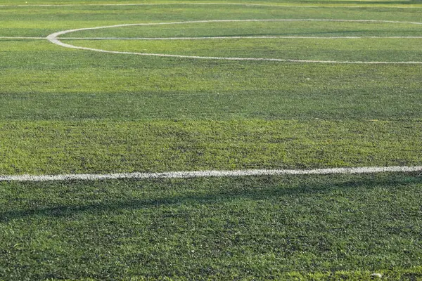 stock image artificial green grass turf sport soccer field with black rubber granules infill