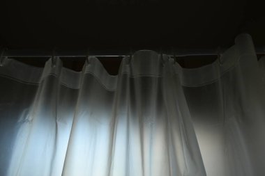 white plastic curtain texture in bathroom, scary scene