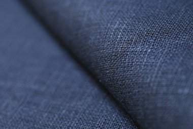 Siyah kenevir doğal kumaş kumaş rengi, tekstil modasının kaba dokusu soyut arkaplan