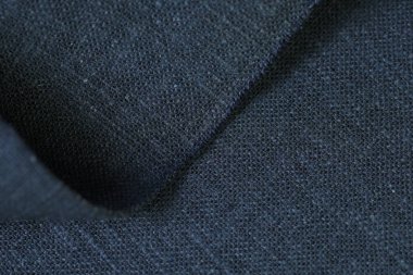 Siyah kenevir doğal kumaş kumaş rengi, tekstil modasının kaba dokusu soyut arkaplan