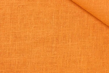 turuncu kenevir doğal kumaş kumaş rengi, tekstil modasının kaba dokusu soyut arkaplan