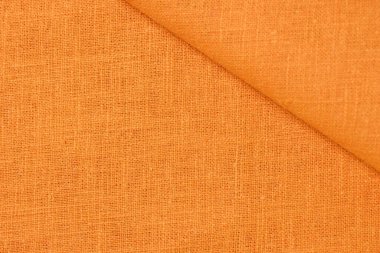 turuncu kenevir doğal kumaş kumaş rengi, tekstil modasının kaba dokusu soyut arkaplan