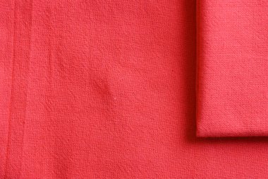 Kumaş kumaşın kırmızı dokusu, moda bezi tasarımı için soyut görüntü
