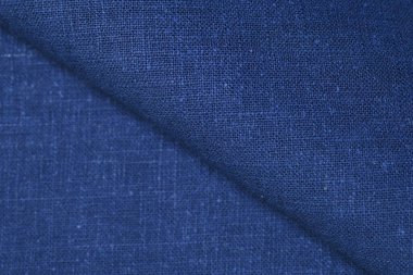 Mavi kenevir doğal kumaş kumaş rengi, tekstil moda soyut arka planının kabataslak kumaşı.
