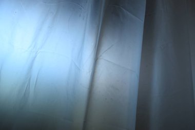 white plastic curtain texture in bathroom, scary scene