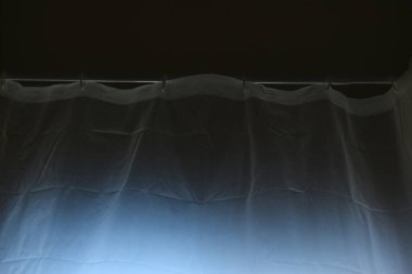 white plastic curtain texture in bathroom, scary scene