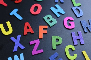 colorful letter alphabet on black background, object for education