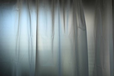 white plastic curtain texture in bathroom, scary scene